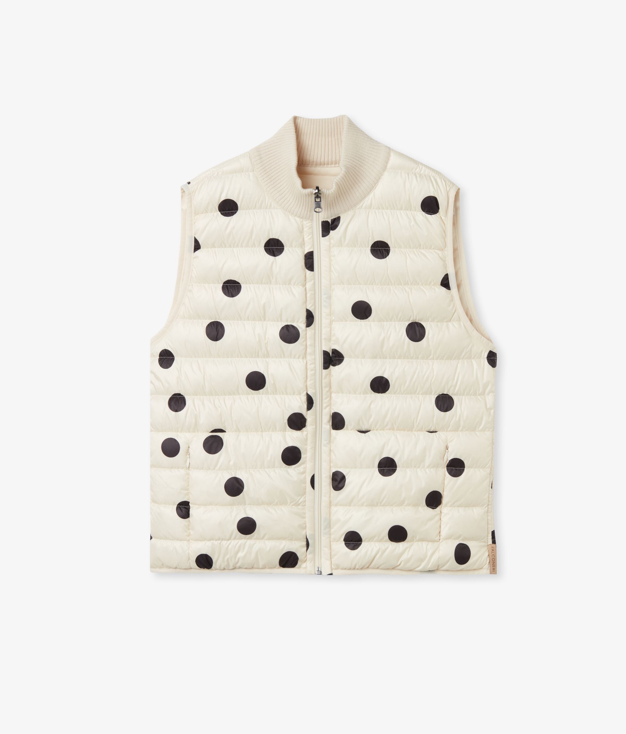 Boja Uzorak crnih točkica na pozadini boje maslaca